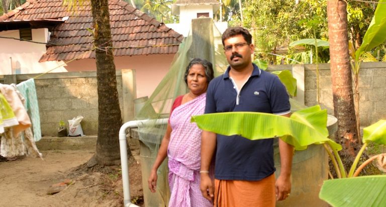 Komalam Ramachandran of Naduvilkara in Thrissur district and her son in front of the well in their house.